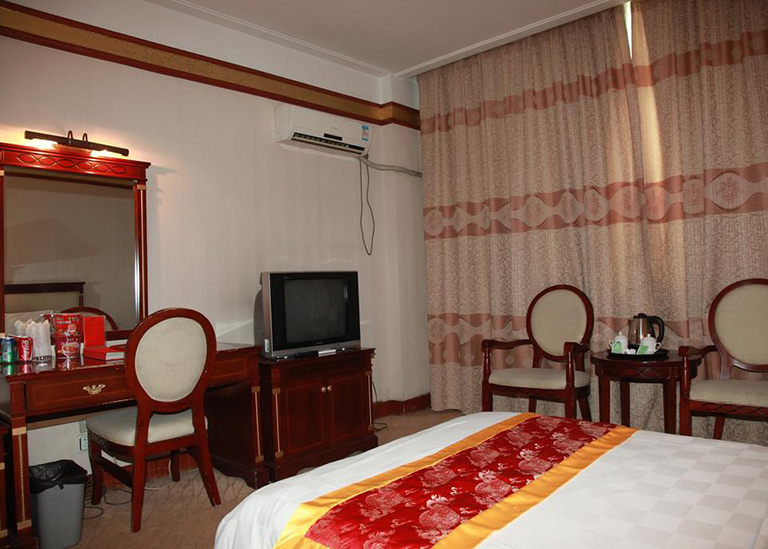 Tibet Yulong Holiday Hotel Deluxe Single Room