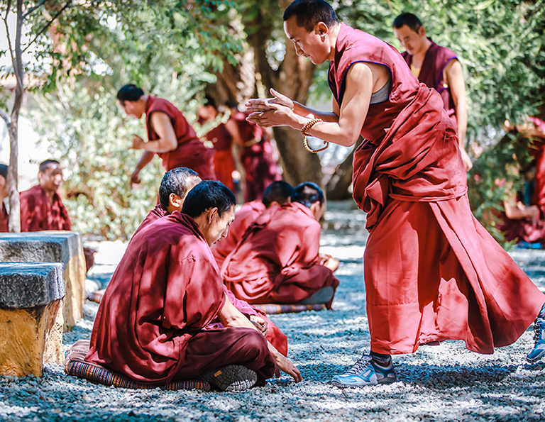 Monks are discussing Buddhism in Sera Monastery Tibet