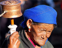 Old Tibetan woman taking the Jokhang Circuit in Tibet